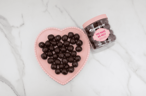 Candy Club V-Day Chocolates on a pink heart plate
