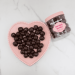 Candy Club V-Day Chocolates on a pink heart plate